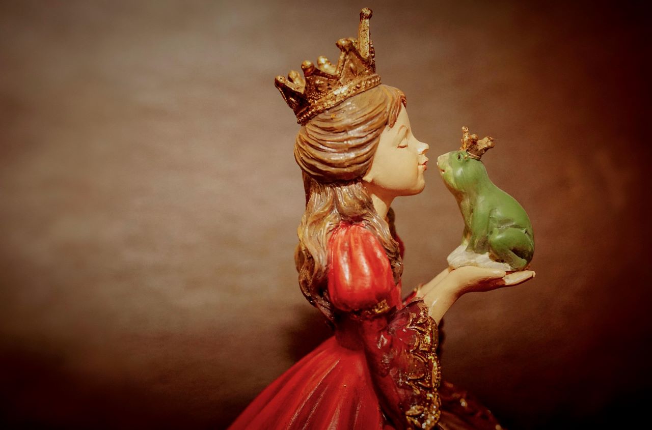 Princess kissing a frog